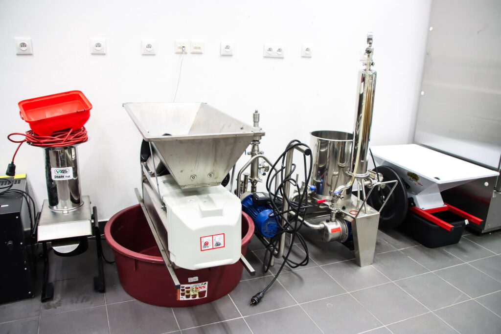 Grape crusher destemmers and diatomaceous earth filter.